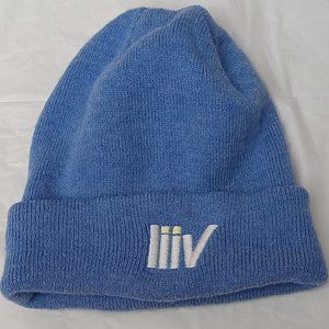 Blue hat with white letters in front "liiv"